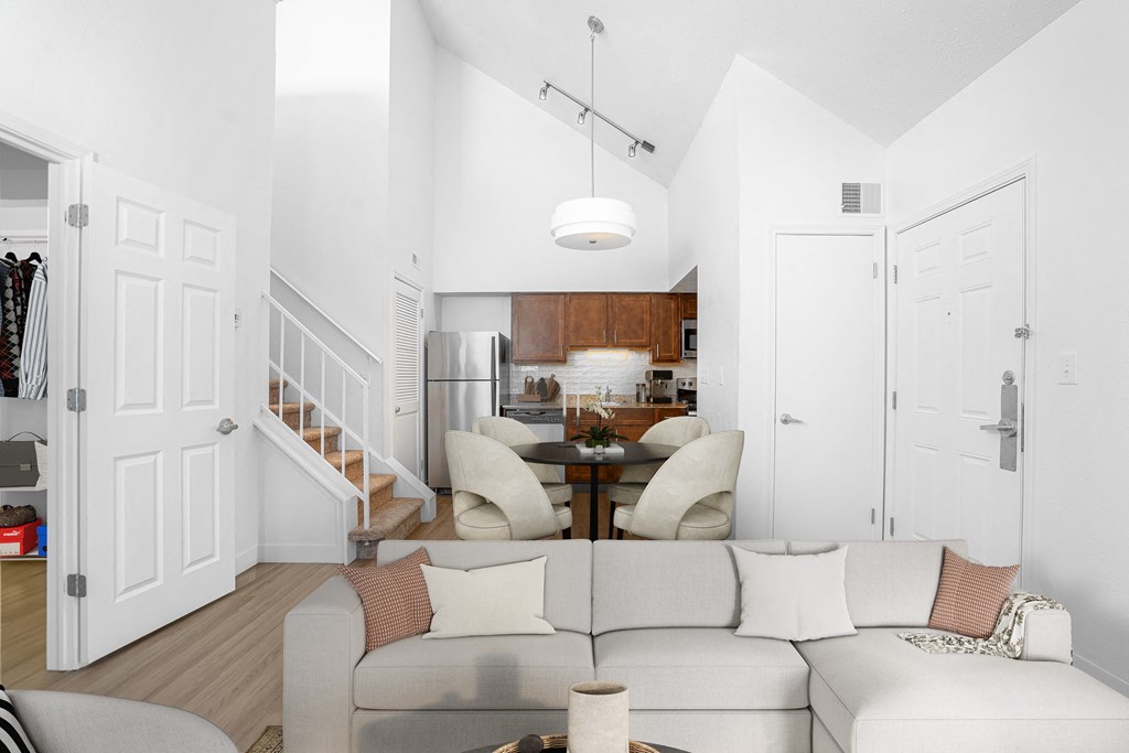 a living room with a couch and a table